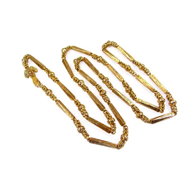 Gold pierced baton and interlinked chain necklace with a hand clasp